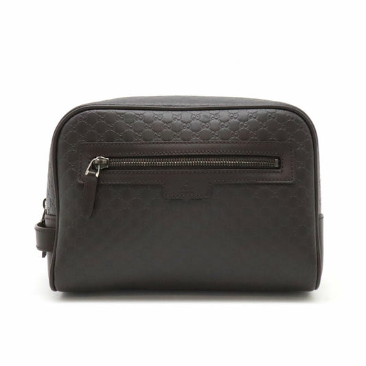 Gucci Microguccissima Leather Clutch Bag