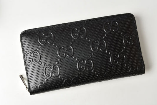 Gucci Leather Zip Wallet GG Embossed